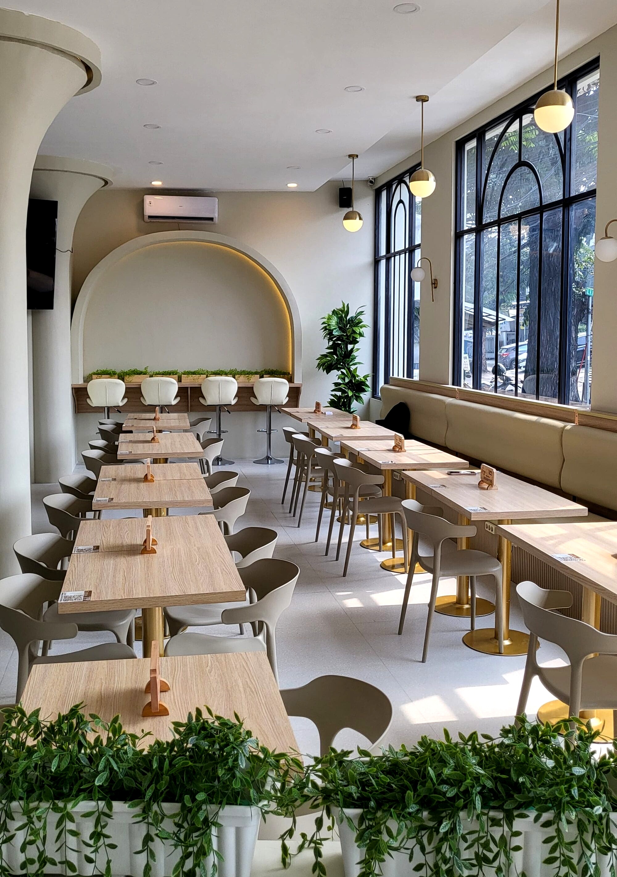 Loffee Coffee &amp; Eatery Tebet interior with coffee cups and dining area